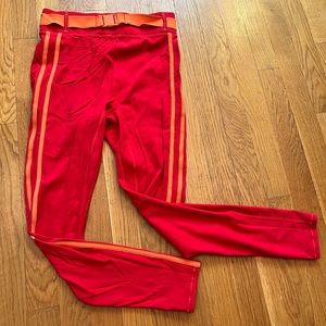 Bandier x solid and striped leggings. Red and orange. Small.